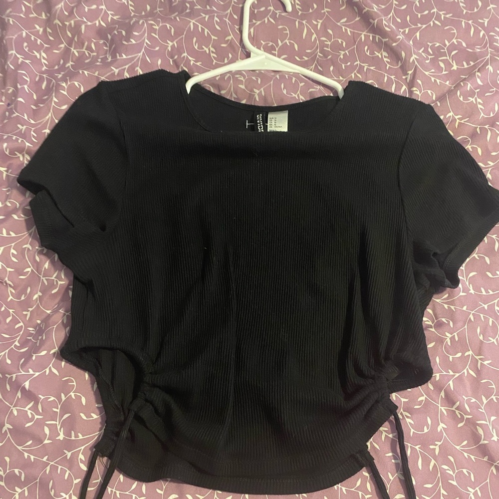 4 shirts , all medium size , with tie up sides